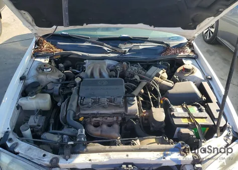 1999 Toyota Camry Le z USA, uszkodzony, nr VIN JT2BF28K0X0179409